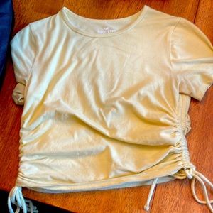 Hollister side drawstring baby tee in a pastel yellow